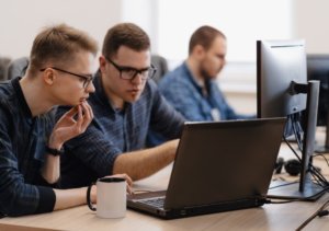 3 Person with Laptop and mug